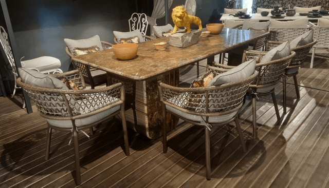 Opulent Oasis Stone & Wicker Dining Table - Bareeki